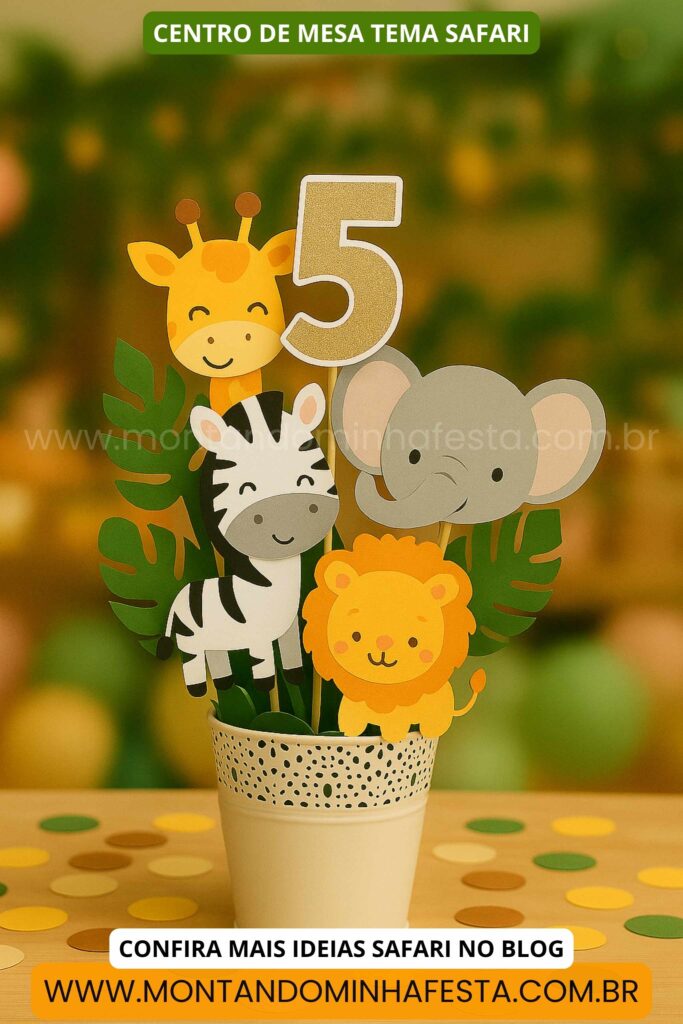 Centro de mesa tema safari com número 5, leão, elefante, zebra e girafa em cachepô branco com folhas verdes decorativas.