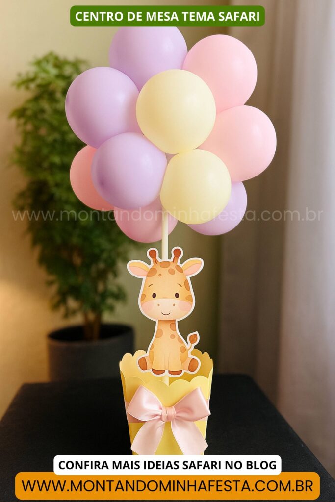 Centro de mesa tema safari com girafa em papel e arranjo de balões nas cores pastel, ideal para festas infantis.